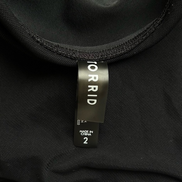 Torrid Asymmetrical Twist Front One-Piece Swim
Dress Black Plus Size 2X - Picture 15 of 16